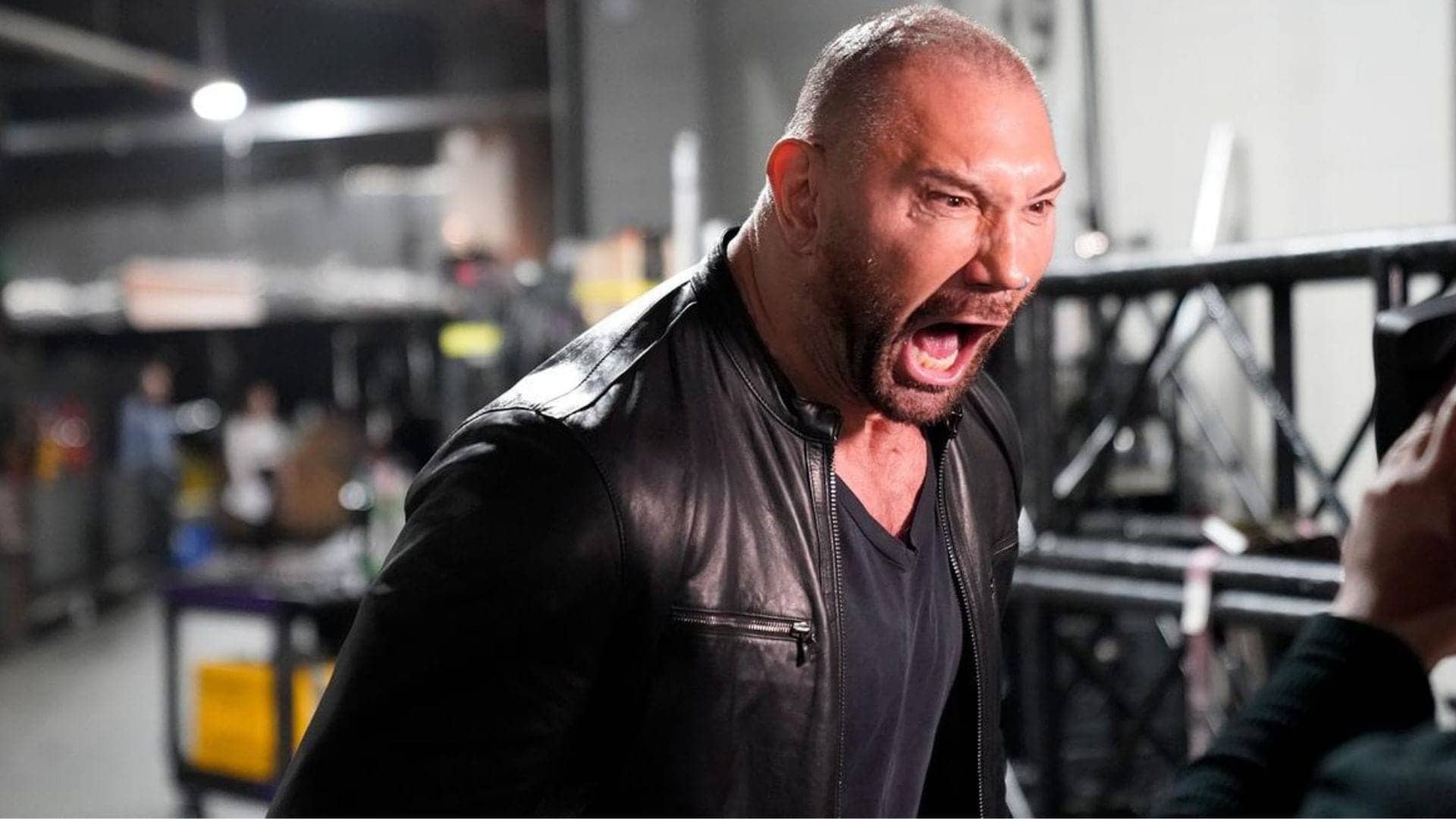 Batista vs. Booker: Who's the Real Fight Starter, Folks?