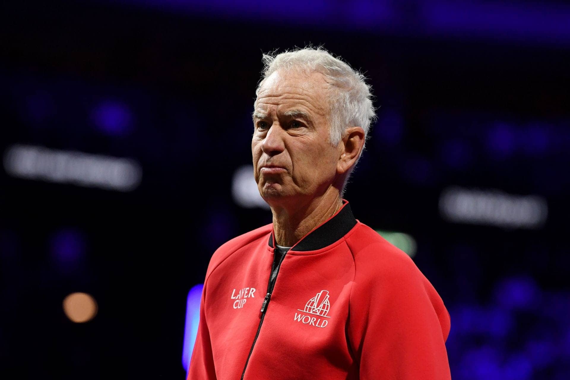 John McEnroe's Airport Showdown: Fan Won't Back Off!