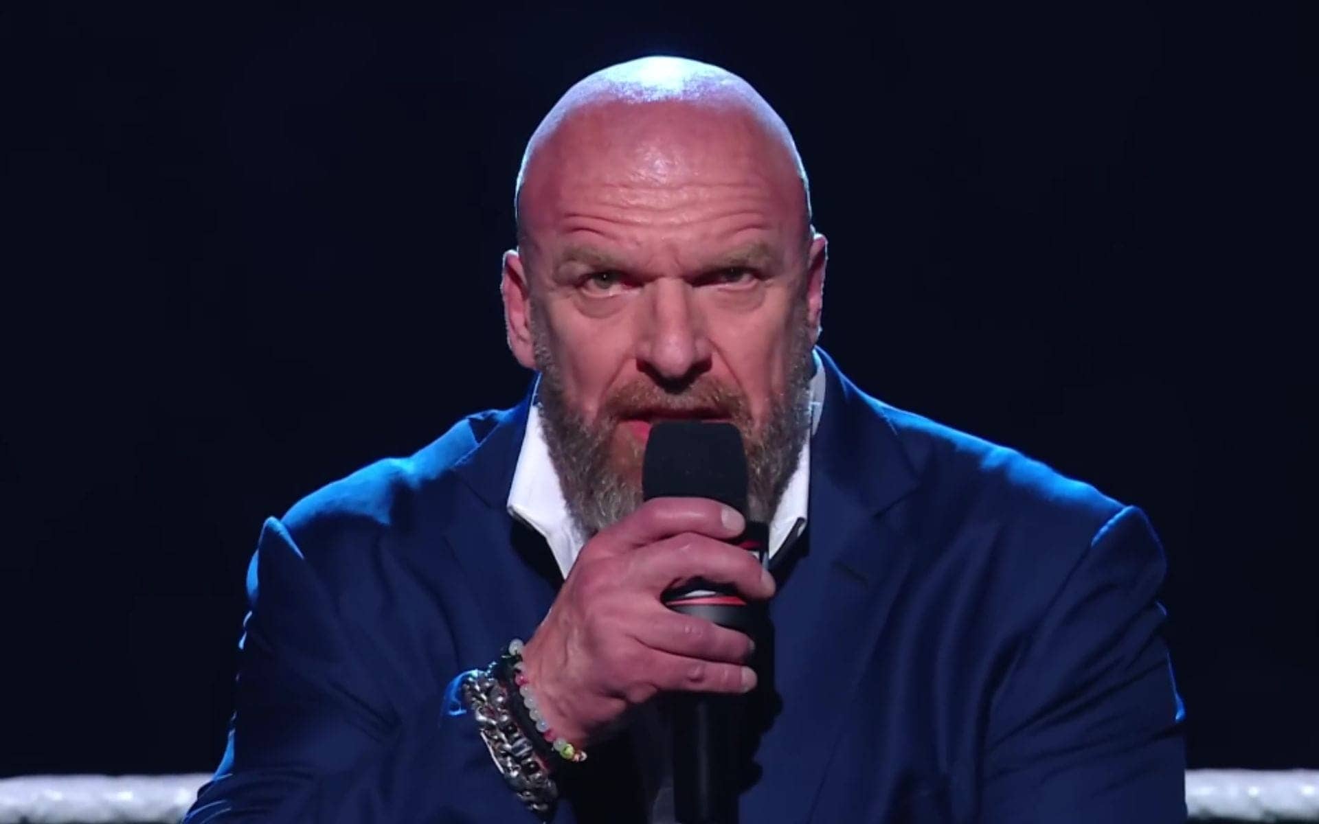 WWE's New Masked Faction Sneaks In Like a Champ