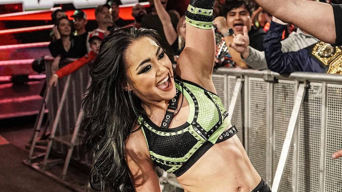 Roxanne Perez sends electrifying love to Booker T, baby!