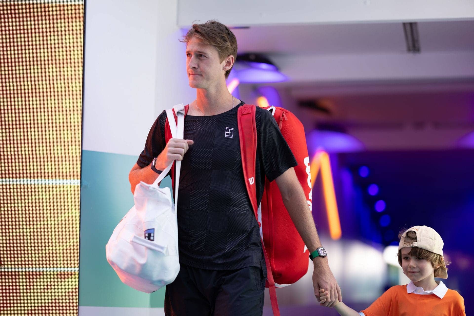 Korda Stuns Alcaraz, Celebrates with Ivana's Sweet Kiss