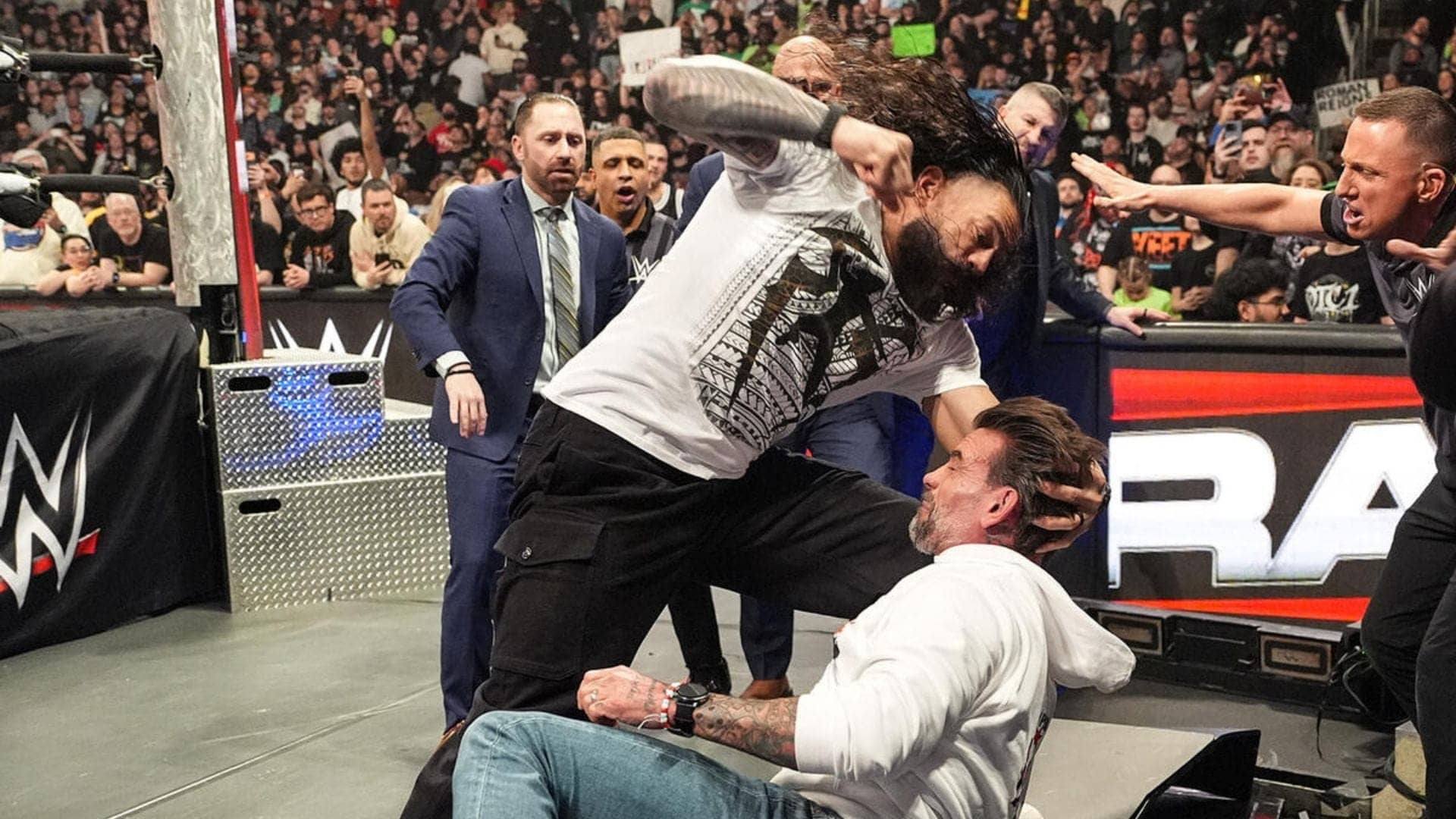 CM Punk breaks silence after being put through a table by Roman Reigns and The Bloodline's ambush on WWE RAW