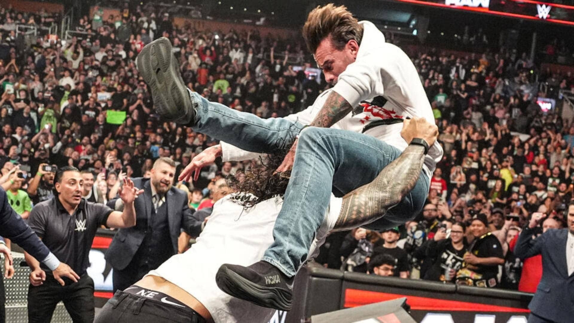 Roman Reigns Obliterates CM Punk on WWE RAW, TKO Group Reacts!