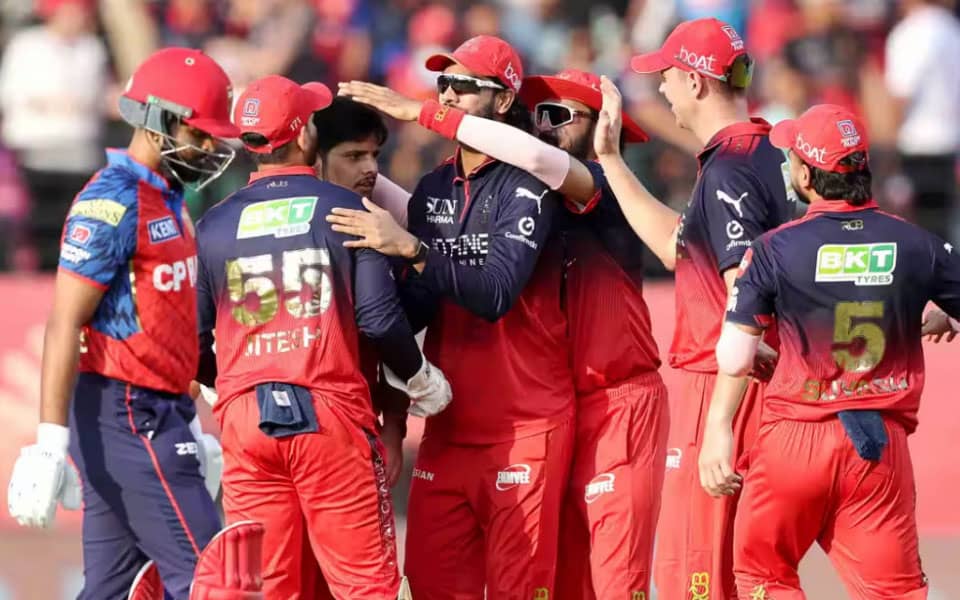 RCB Snags Playoff Spot, Playfully Trolls PBKS Online!