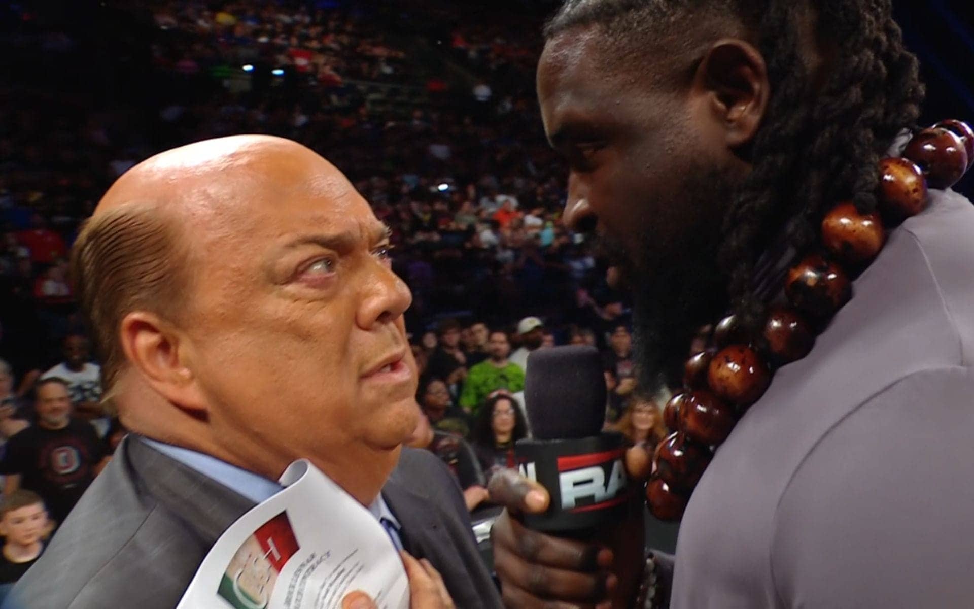 Oba Femi Challenges Brock Lesnar in Clash Contract Signing