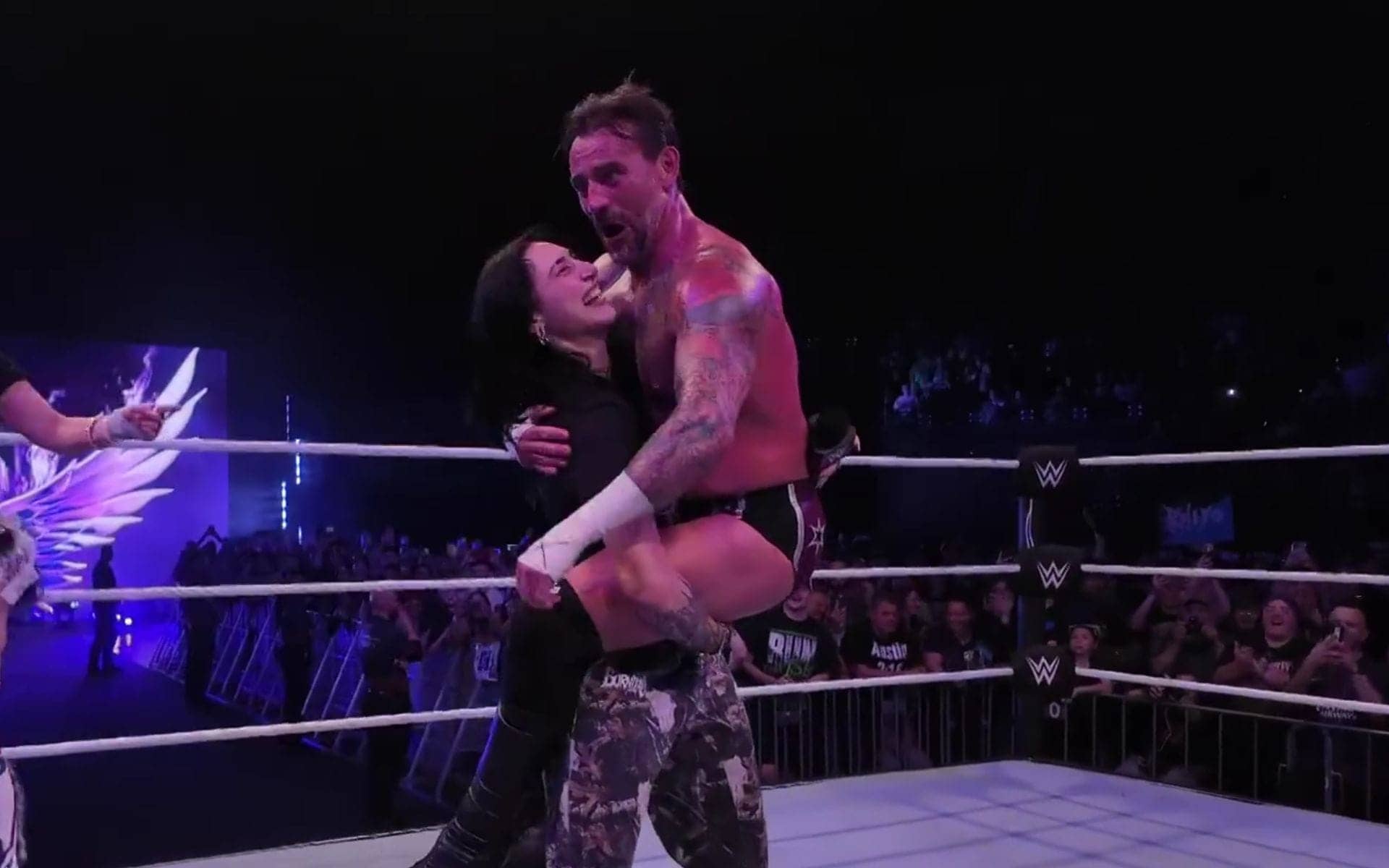 Rhea Ripley Cheers for CM Punk's Epic Title Fridge Photo