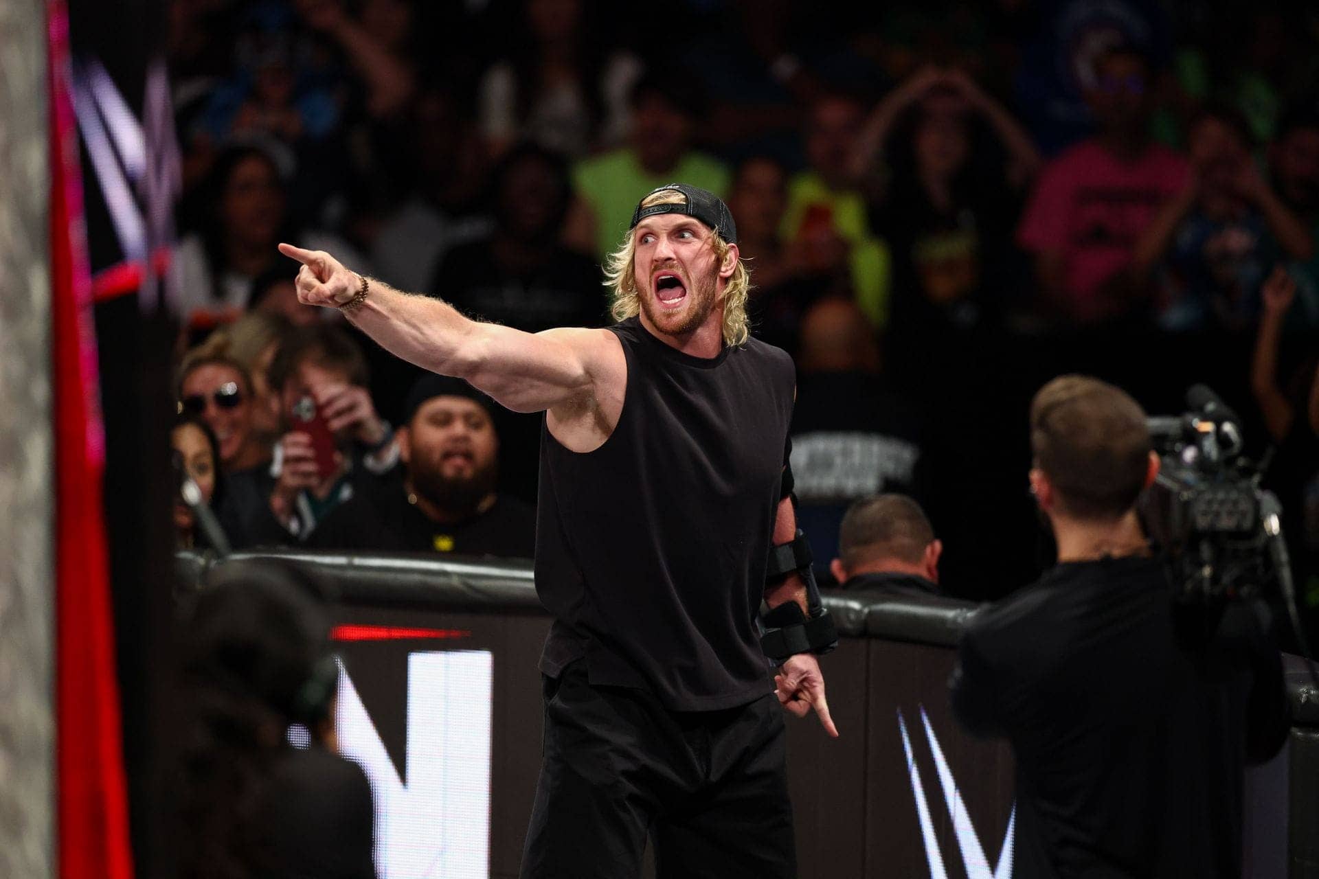 Logan Paul Takes a Shot at WWE Buddies While Cheering Soccer