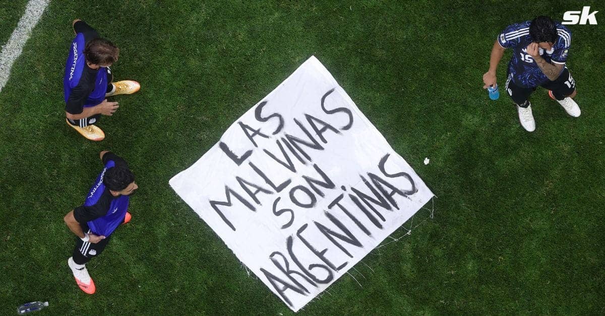 Argentina Players Wave Banner After Defeating England