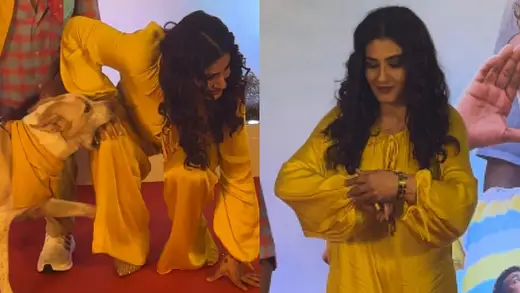 Raveena Tandon Slays While Doggo Almost Takes a Bite
