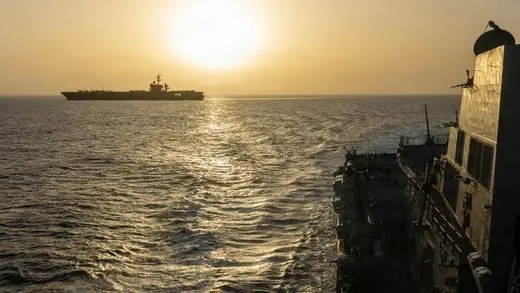 U.S. Troops and Carriers Rush to Middle East After Fire