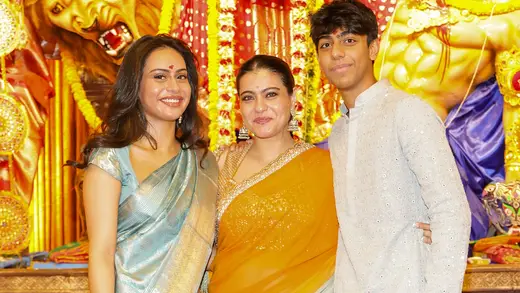 Kajol Dazzles In Orange Saree At Durga Puja Bash